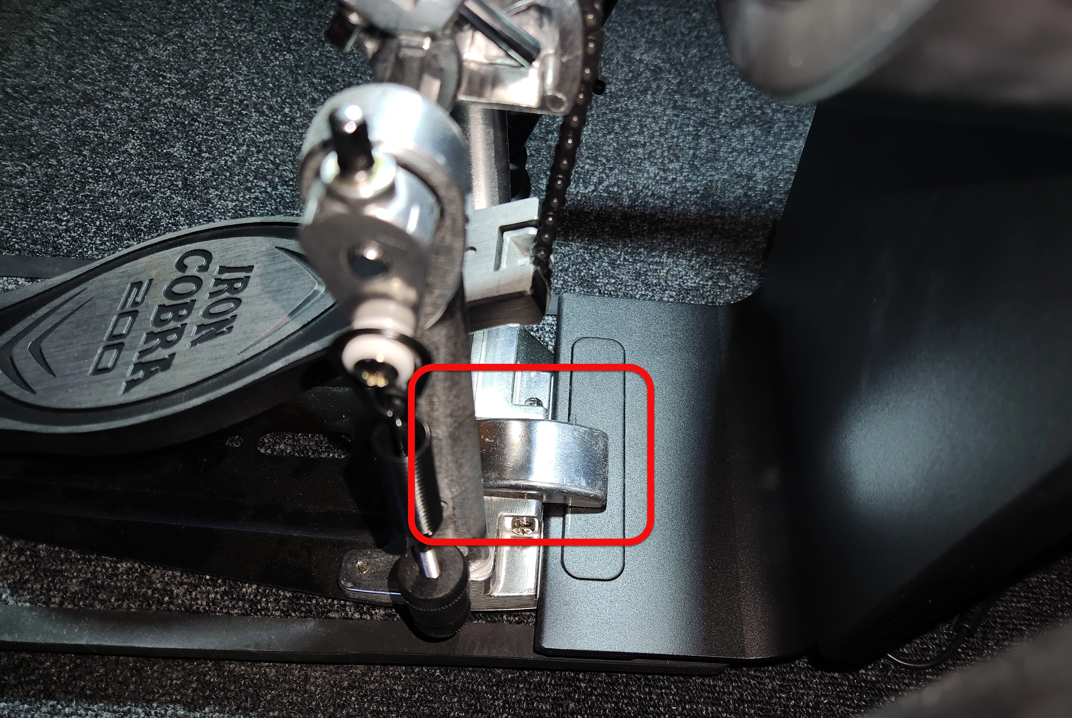 The Tama pedal clamps to the kick drum tab