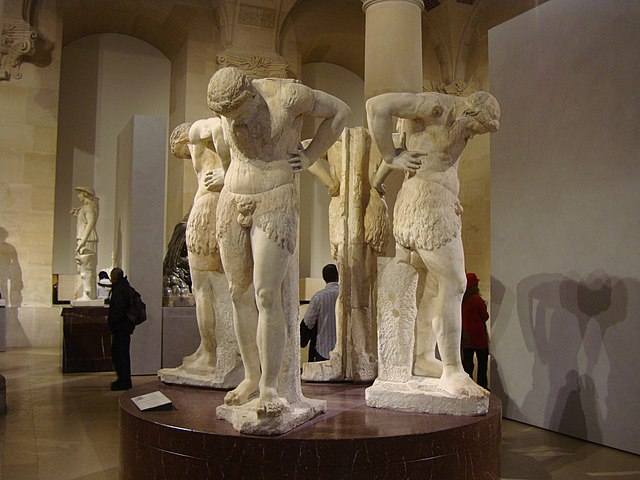 Four statues depicting omphaloskepsis (photo by Gregg Tavares)